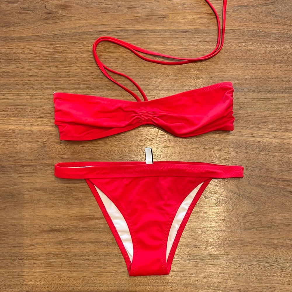 Solid and striped red bandeau bikini